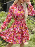 Perfee Tie Front Printed Long Sleeve Mini Dress